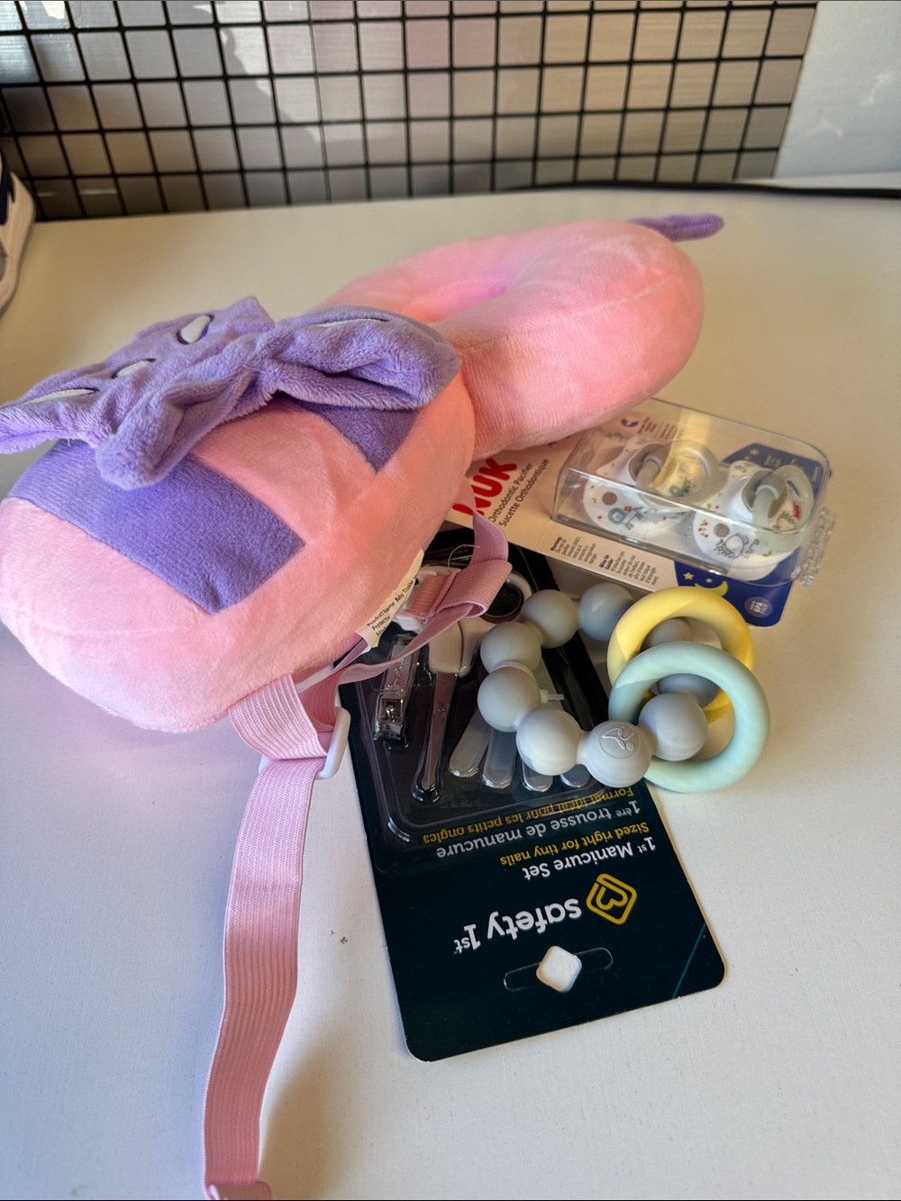 Plush Pink & Purple Kids Neck Pillow with Teether Rings